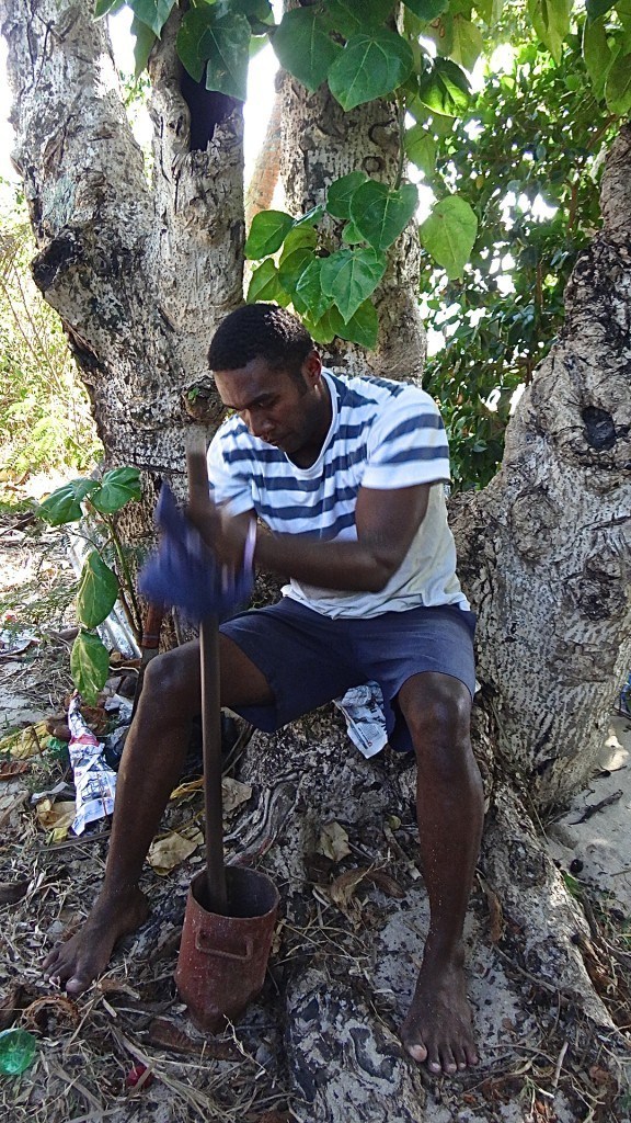 Captain Cook Cruises Fiji man making kava