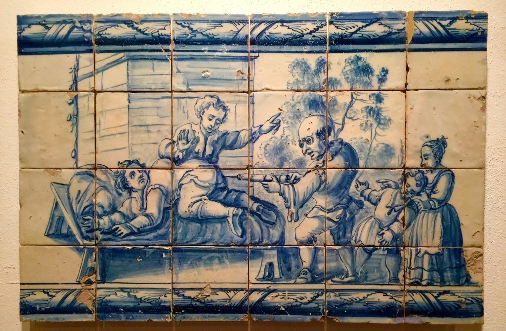 Tile in National Tile Museum of Portugal, comic scene