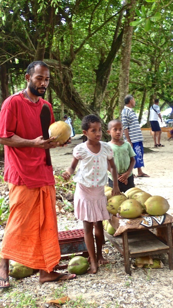 Taveuni, Fiji man with coconut and machete